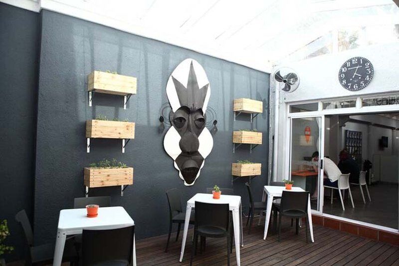 Never At Home Green Point Kapstaden Exteriör bild The interior of the restaurant